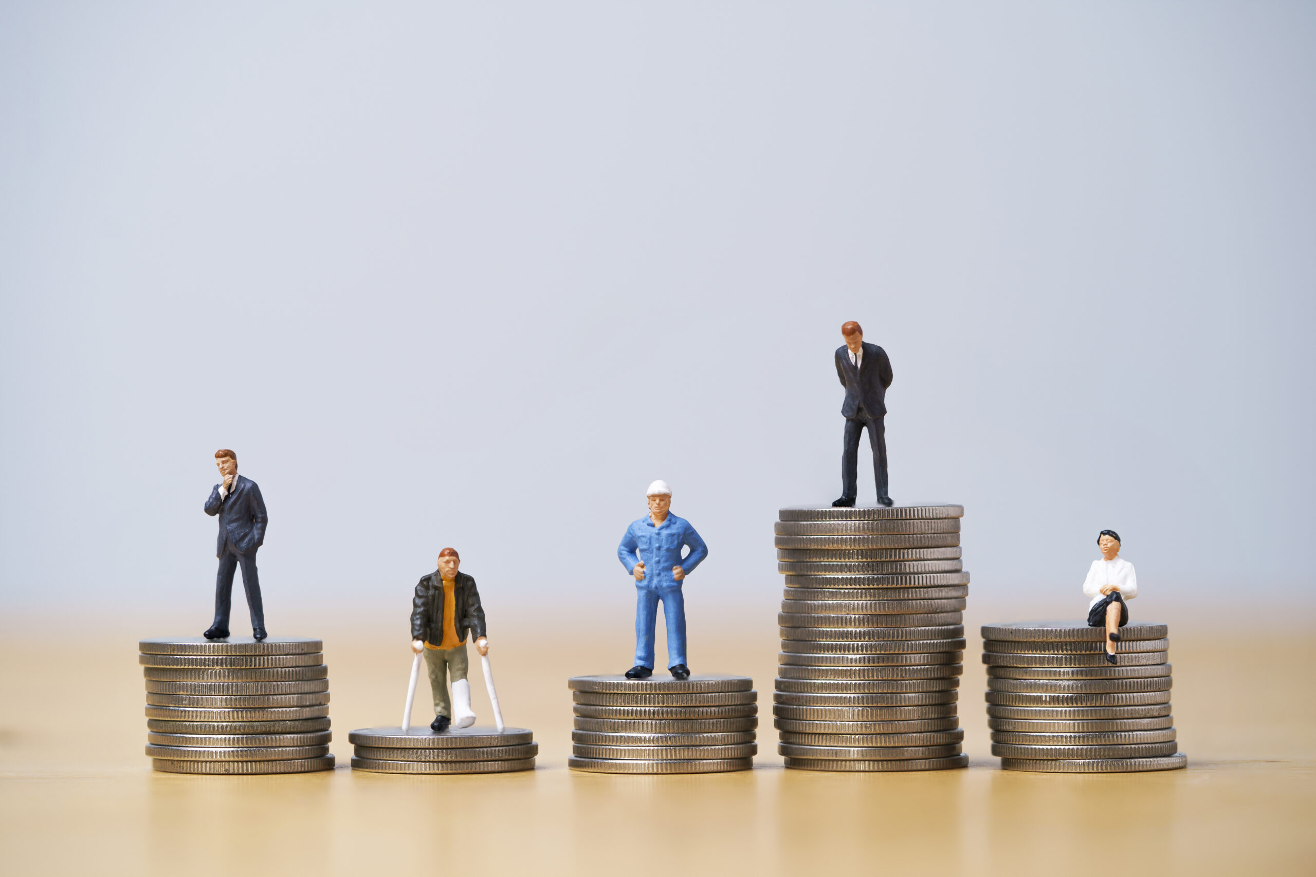 Five Miniature figure in each career standing to different high