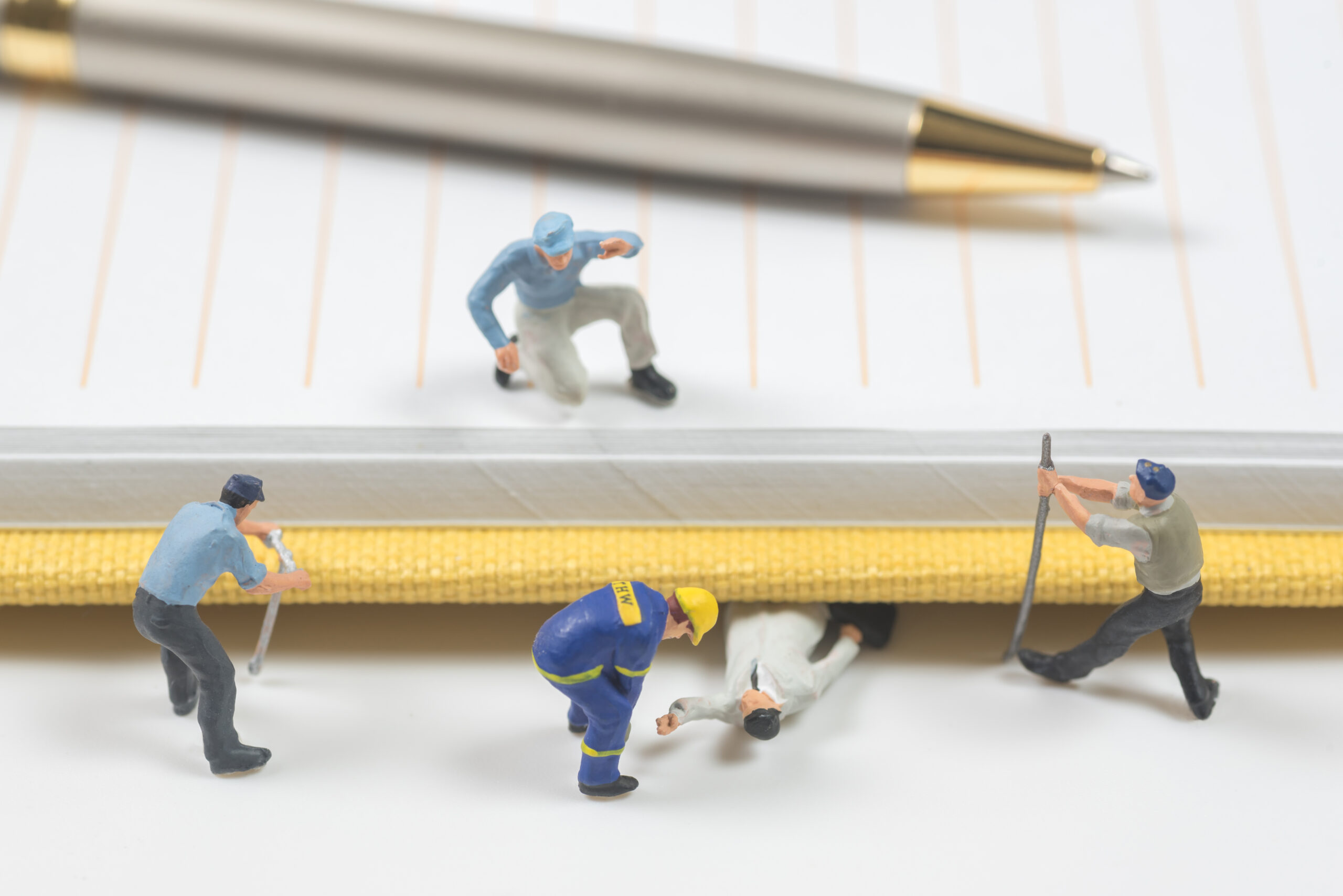 miniature people are trying to help people who were crushed by n